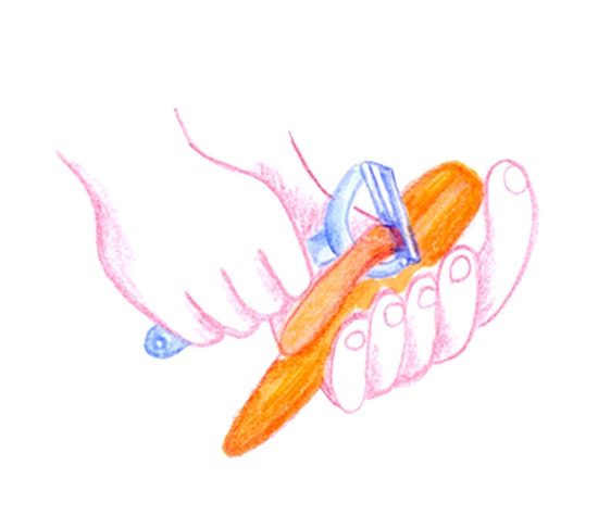 Hands peeling a carrot
